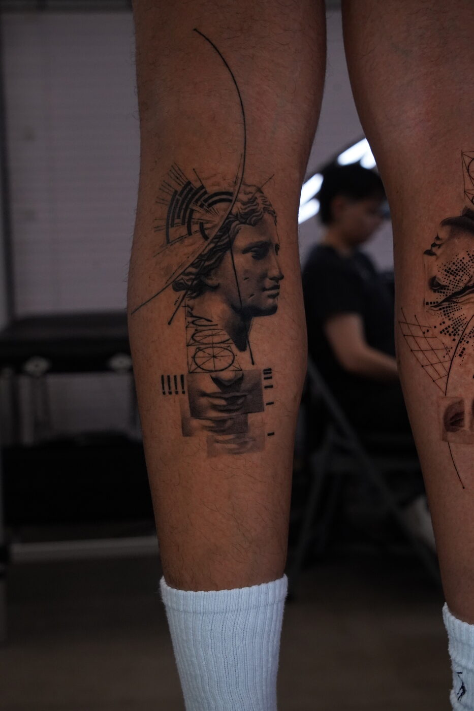Black and grey surrealism tattoo by Zackel