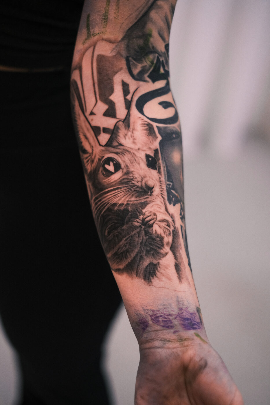 Black and grey abstract realism tattoo by Zackel